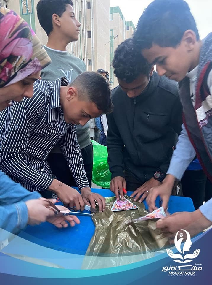 Residents of the suburb district join the Mashkaat Noor Foundation in celebrating the arrival of the month of Ramadan.